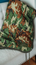 Load image into Gallery viewer, Stay warm with this quality woodland camo woobie blanket
